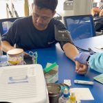employees are having their blood pressure checked